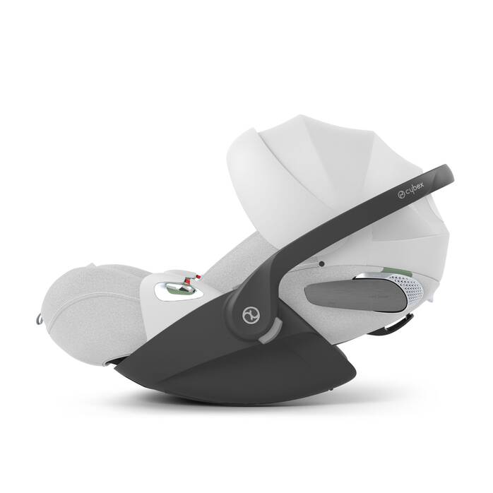 Cybex Cloud T i-Size baby-autostoel in platinum white , getoond in liggende positie met ISOFIX basis.