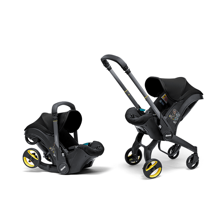 Doona i autostoel in Nitro Black, transformeert van autostoel naar vervoersmiddel met wielen, voldoet aan i-Size normen.