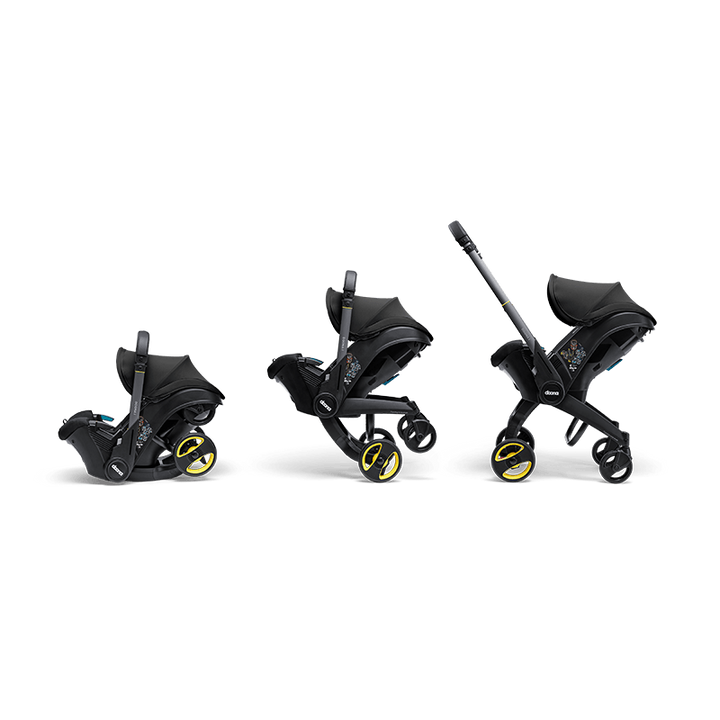 Doona i autostoel in Nitro Black, transformeert van autostoel naar vervoersmiddel met wielen, voldoet aan i-Size normen.
