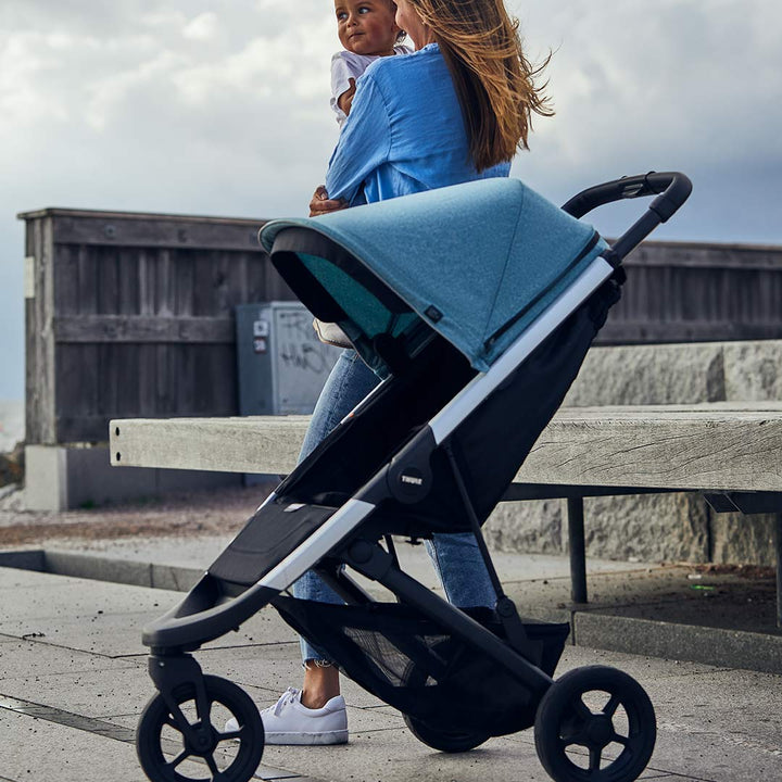 Thule Spring Buggy - Teal Melange on Black, lichtgewicht en eenvoudig opvouwbaar