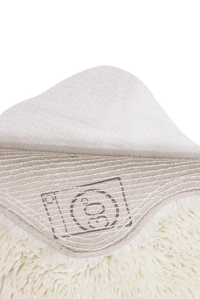 Lorena Canals wollen tapijt 75x110 cm in schapenvachtstijl, wit, met antislip onderlaag